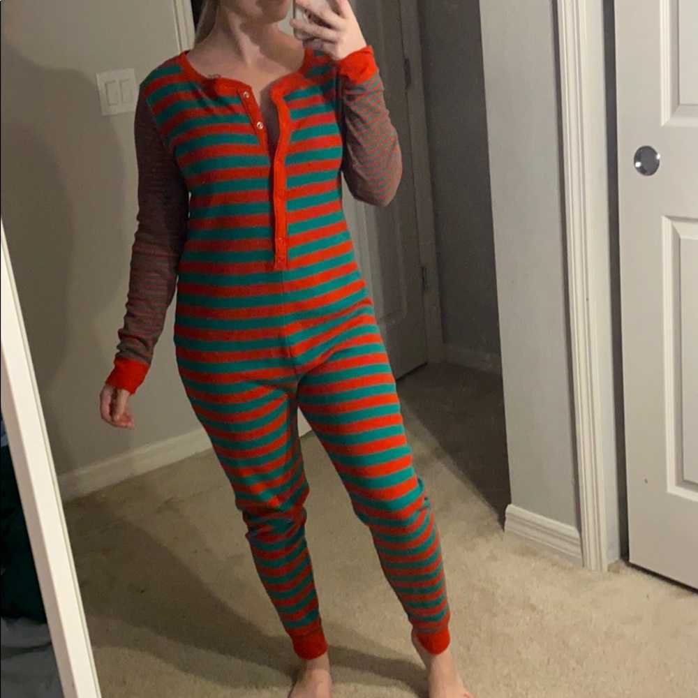 Laura’s boutique green and red striped onesie